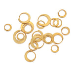 Hand forged 24ct gold hoops with a hand hammered finish.  Pure gold hoop earrings by Sarah Herriot.