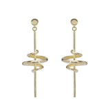 Acrobat long drop earrings in 18ct gold by Sarah Herriot.