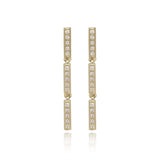 Bamboo jointed earrings in 18ct gold and white diamonds by Sarah Herriot.