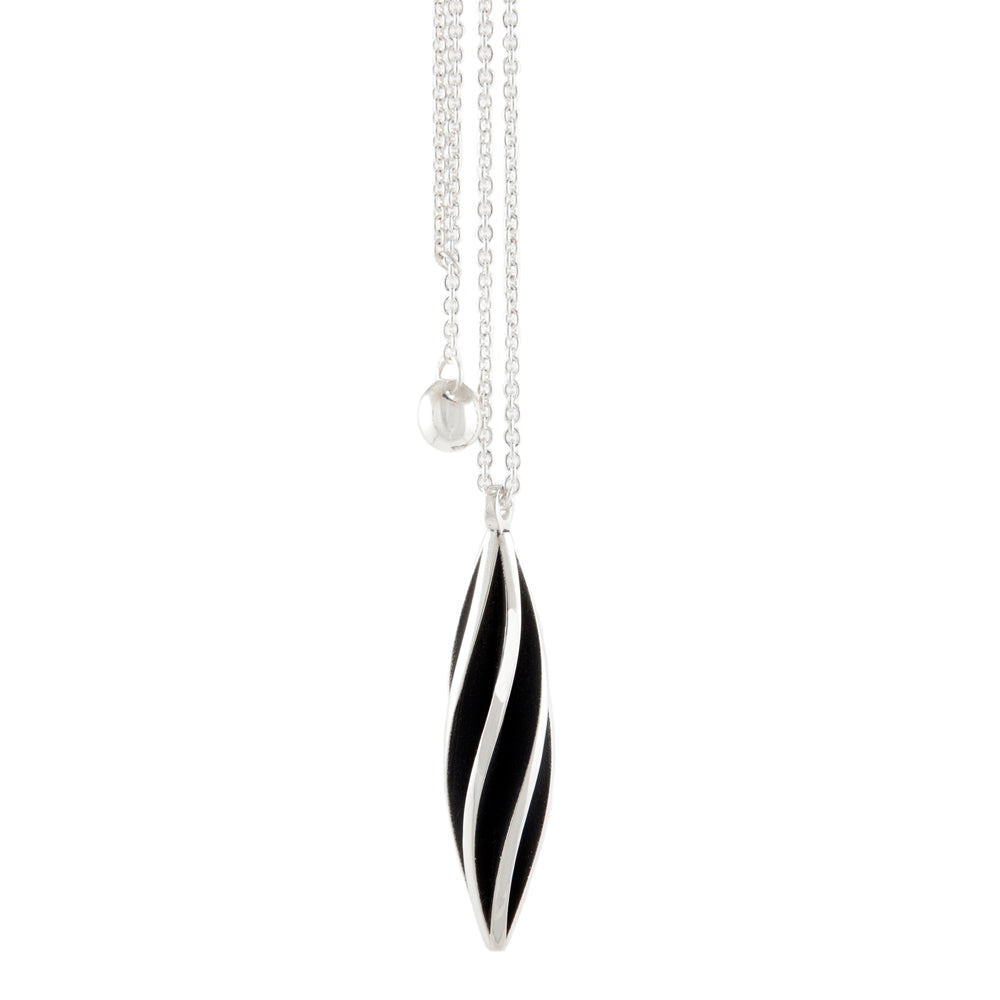 Beat twist pendant is a wonderfully rythmic form in silver, constructed using twisted sheets of silver and oxidised or textured recesses to accentuate the sculptural nature of the piece.  Beat twist pendant by Sarah Herriot.