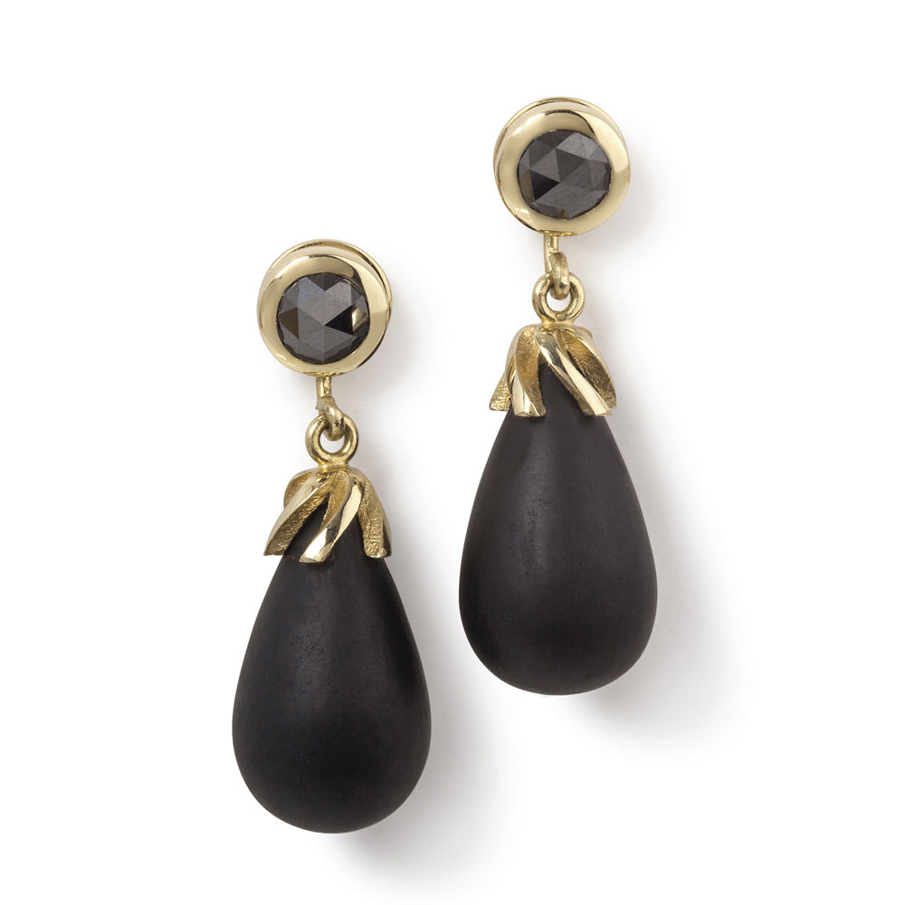 Black diamond stud earrings with an onyx drop in 18ct gold by Sarah Herriot.