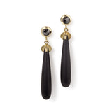 Black diamond stud earrings with a long onyx drop in 18ct gold by Sarah Herriot.