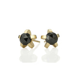 Splice stud earrings sit proud from the ear, holding a gorgeous rose cut black diamond in 18ct gold. Splice black diamond stud earrings by Sarah Herriot.