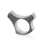 One off bone ring, hand carved in wax and cast in silver, blackened textured surfaces accentuate the design. Bone ring by Sarah Herriot.