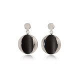 Cats eye earrings in silver with oxidised sections by Sarah Herriot.