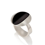 Cats eye ring in silver with oxidised recess by Sarah Herriot.