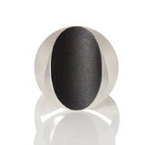 Cats eye ring in silver with oxidised recess by Sarah Herriot.