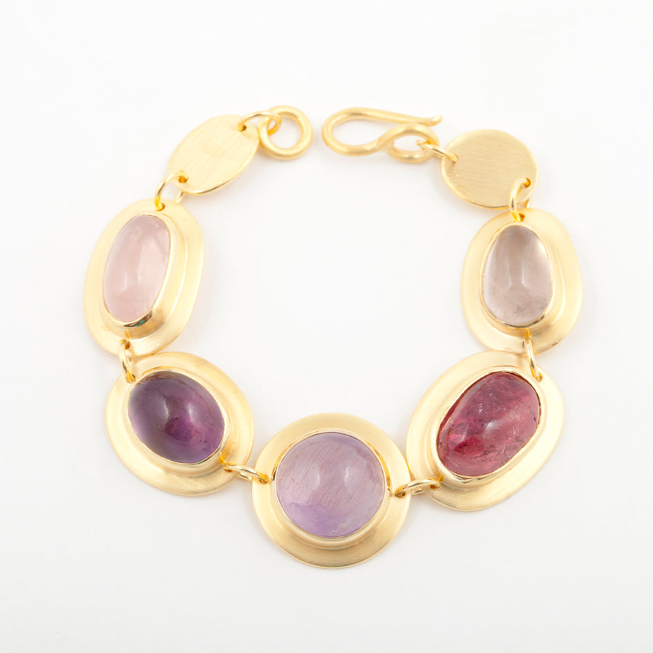 Commission bracelet in gold plated silver with clients own gemstones by Sarah Herriot.