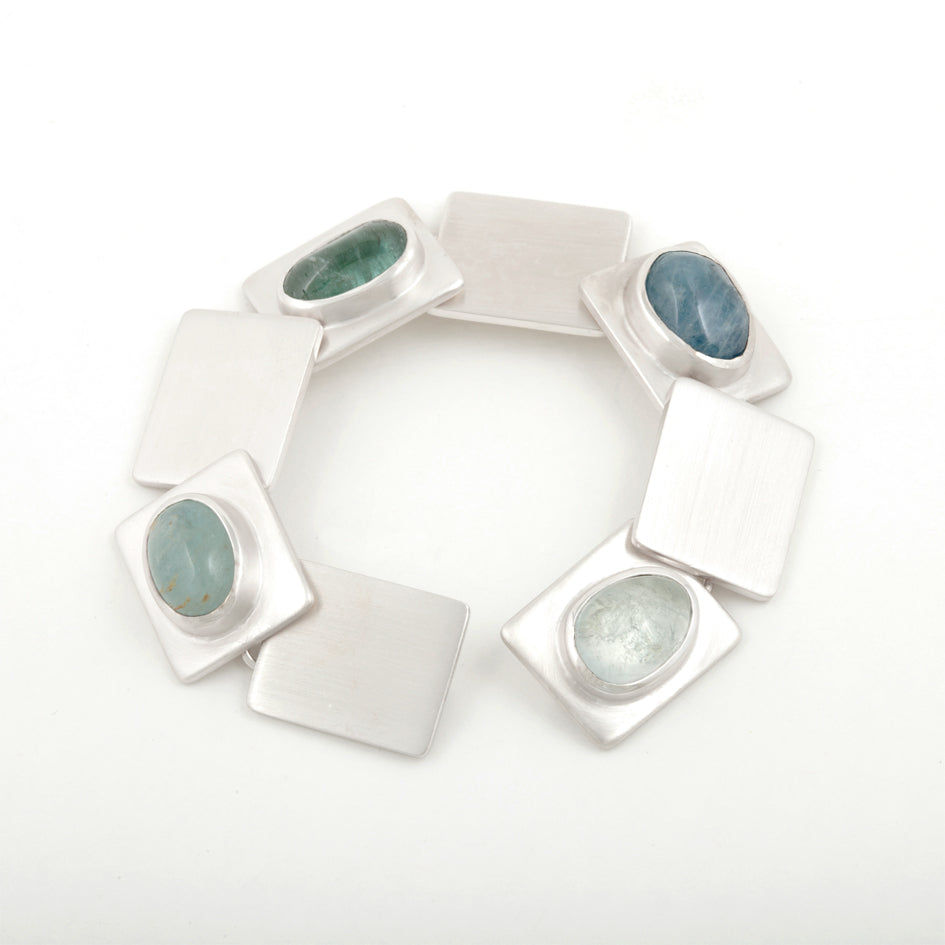 Commission bracelet in silver with clients own gemstones by Sarah Herriot.