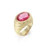 Strata ring in 18ct gold with beautiful rhythmic indented pattern covering the walls and set with a large juicy rubellite tourmaline. This ring has a flat base, so will stand up by itself, still working when not being worn. Strata ring by Sarah Herriot.