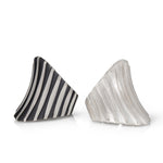 Corset ring is formed of elegant tapered lines in silver, with a two way curve and oxidised recesses accentuating the flowing design. Corset ring by Sarah Herriot.