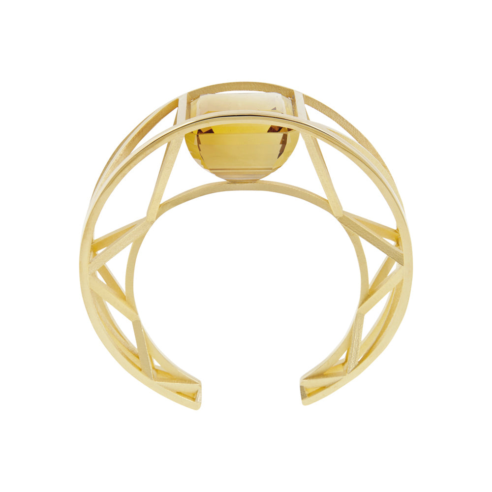 18ct gold crane bangle with clients own gemstone 185ct topaz by Sarah Herriot