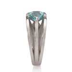 Platinum crane ring in platinum with clients trillion pariba tourmaline by Sarah Herriot.