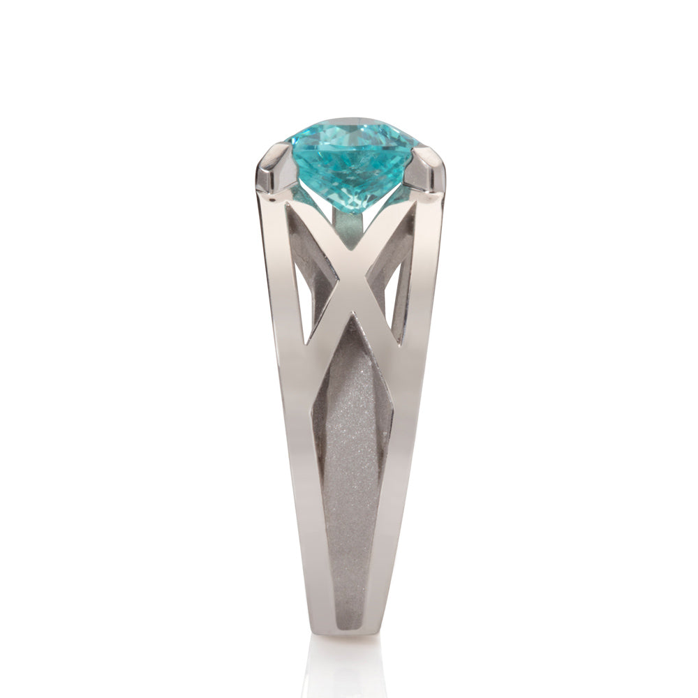 Platinum crane ring in platinum with clients trillion pariba tourmaline by Sarah Herriot.