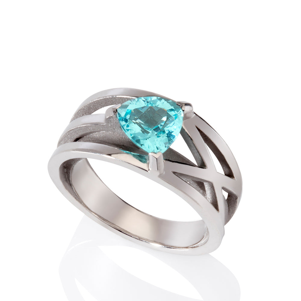 Platinum crane ring in platinum with clients trillion pariba tourmaline by Sarah Herriot.