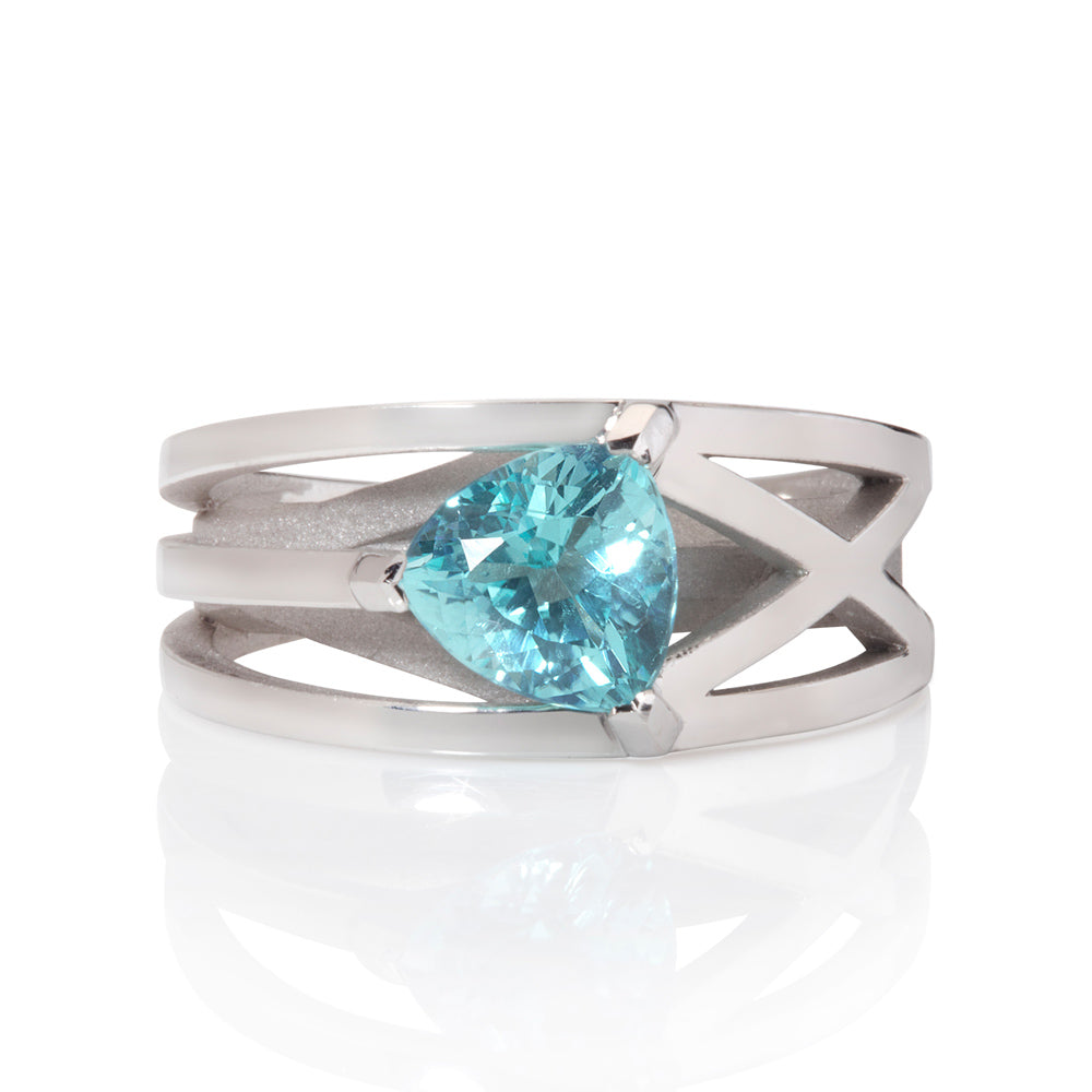Platinum crane ring in platinum with clients trillion pariba tourmaline by Sarah Herriot.