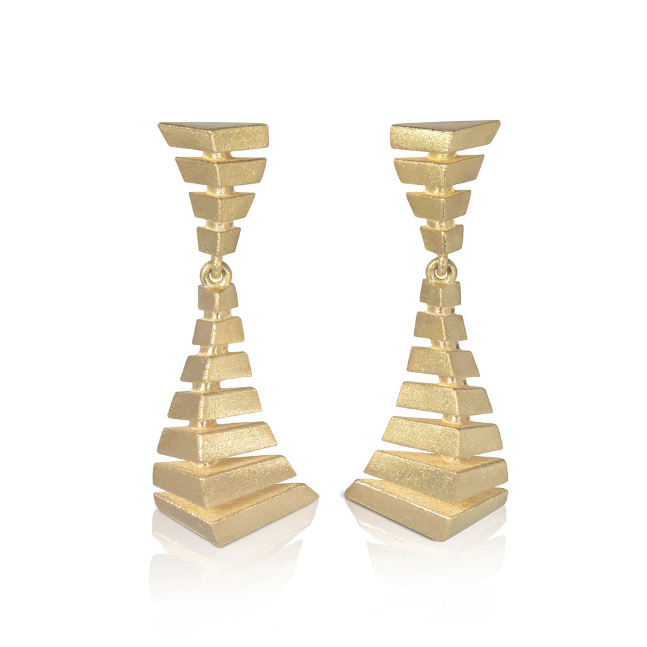 Dune earrings, studs with a drop element, crafted in 18ct yellow gold with a deep textured finish.  Based on desert sand dune formations. Dune earrings by Sarah Herriot.