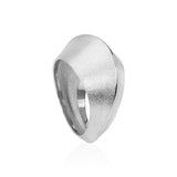 Dune ring in silver, based on dreamy desert sand formations, with a modern deconstructed twist. A linear highlight slowly undulates around the surface of the ring. Dune ring by Sarah Herriot.