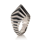 Silver ring based on desert sand dune forms with a modern twist.  Dune ring by Sarah Herriot.