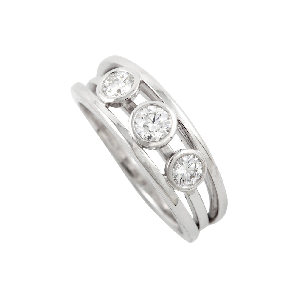 Engagement ring in platinum with round diamonds by Sarah Herriot.