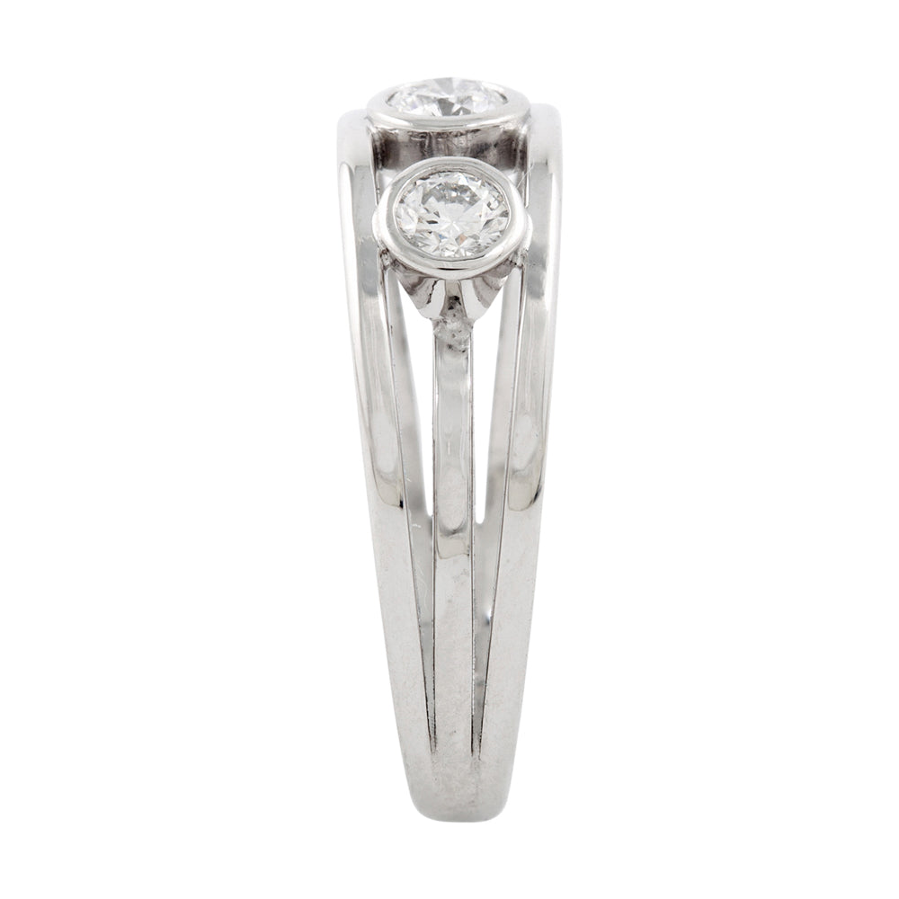 Engagement ring in platinum with round diamonds by Sarah Herriot.