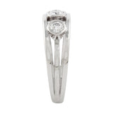 Engagement ring in platinum with round diamonds by Sarah Herriot.