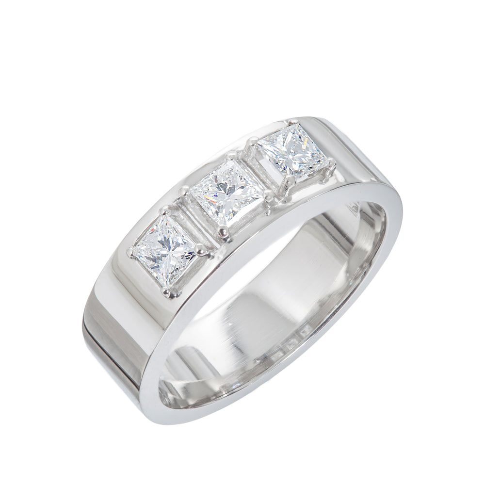 Engagement ring in platinum with princess cut diamonds by Sarah Herriot.
