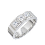Engagement ring in platinum with princess cut diamonds by Sarah Herriot.
