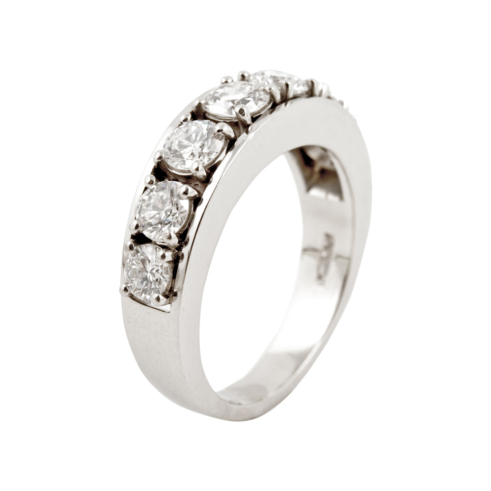 Engagement ring in platinum with round diamonds by Sarah Herriot.