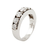 Engagement ring in platinum with round diamonds by Sarah Herriot.