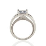 Crane ring in platinum with square grey/blue sapphire by Sarah Herriot.