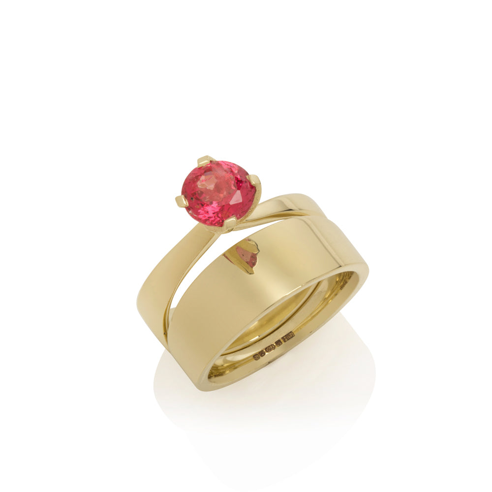 Twist collet ring in 18ct gold with round pink spinel (and wedding band) by Sarah Herriot.