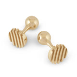 Escalator cufflinks are a clever design formed of spaced sheets of 9ct gold with a gently undulating top surface while the textured recesses accentuate the form. An abstract form with linear deconstruction. A refined choice for those who appreciate understated sophistication and exceptional craftsmanship in fine jewellery. Escalaor cufflinks by Sarah Herriot.
