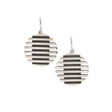 Escalator earrings have a polished wave surface and oxidised recesses to create a modern structure in silver.  Escalator earrings by Sarah Herriot.