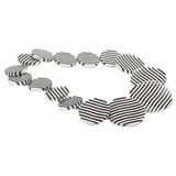 Escalator neckpiece in brushed and oxidised silver by Sarah Herriot.
