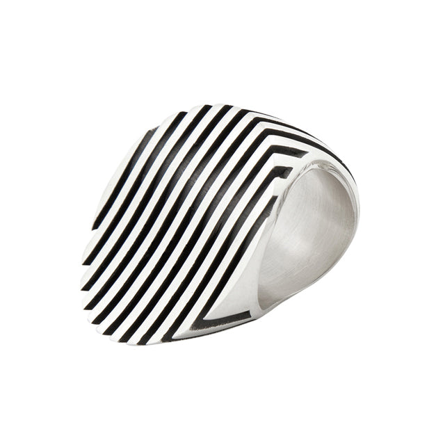 Escalator ring is a clever design formed of spaced sheets of silver with a gently undulating surface where the oxidised recesses accentuate the form. An abstract form with linear deconstruction.  Escalator ring by Sarah Herriot.