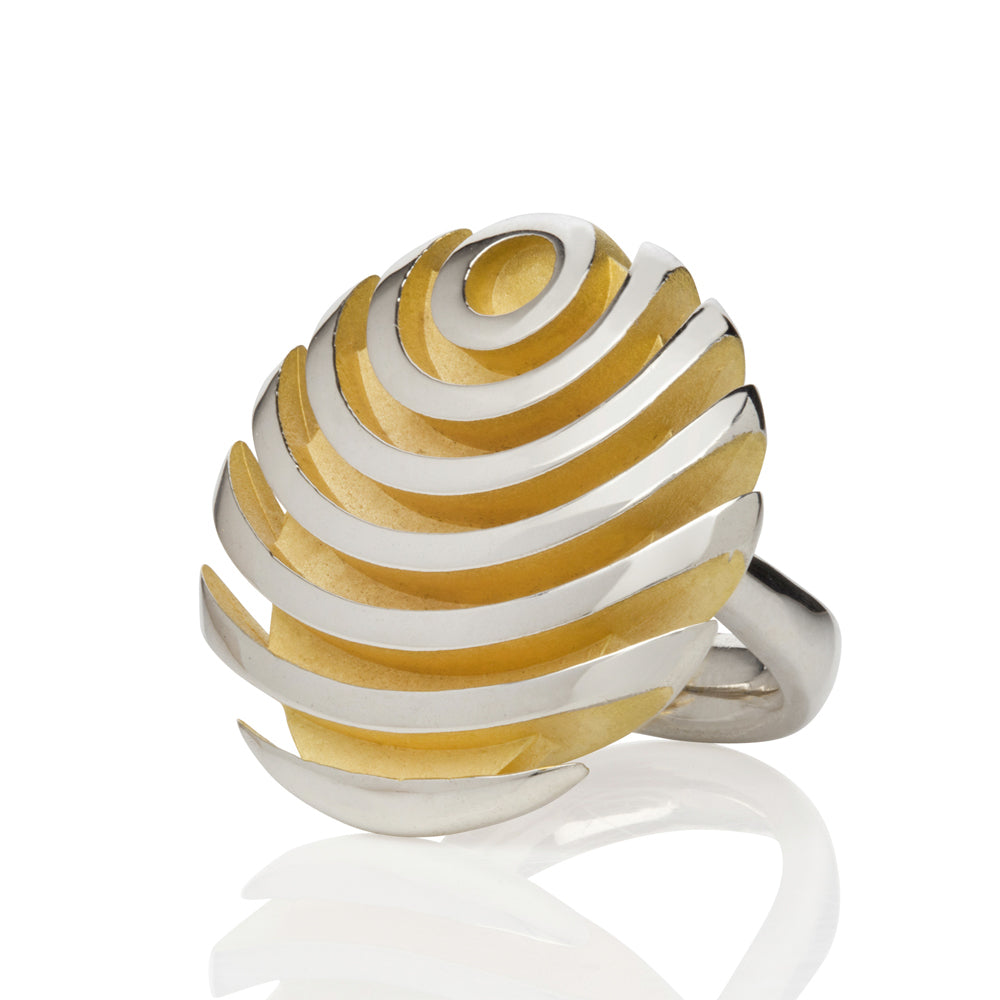 Fish button ring in silver with gold plated interior by Sarah Herriot.