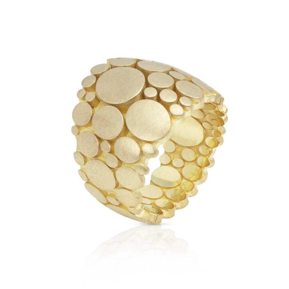 Galaxy ring is an elegant construction using circle motif in 18ct gold.  Galaxy ring by Sarah Herriot.  Brushed exterior, polished interior.