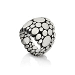 Galaxy ring is an elegant construction using circle motif in sterling silver. Sarah's imagining of the night sky, packed full of stars, as it was in her childhood in new zealand.  Galaxy ring by Sarah Heriot.