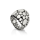 Galaxy ring is an elegant construction using circle motif in sterling silver. Sarah's imagining of the night sky, packed full of stars, as it was in her childhood in new zealand.  Galaxy ring by Sarah Heriot.