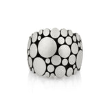Galaxy ring is an elegant construction using circle motif in sterling silver. Sarah's imagining of the night sky, packed full of stars, as it was in her childhood in new zealand.  Galaxy ring by Sarah Heriot.