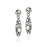 Galaxy drop earrings are an elegant construction using a circle motif on front and back of the piece, in oxidised silver.  Galaxy drop earrings by Sarah Herriot.