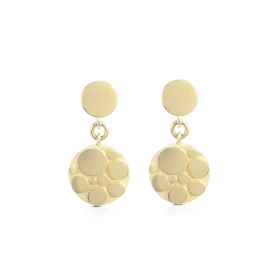 Galaxy earrings, stud fitting with an circular drop constructed using a circle motif in 18ct gold.  Galaxy drop earrings by Sarah Herriot.