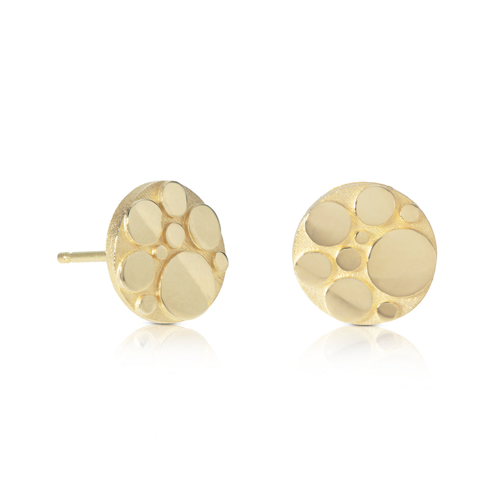 Galaxy stud earrings, constructed using a circle motif in 18ct gold.  Galaxy stud earrings by Sarah Herriot.