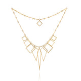 Graphic diamond neckpiece in 18ct gold by Sarah Herriot.