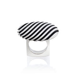 Hazard ring in silver with oxidised recesses by Sarah Herriot.