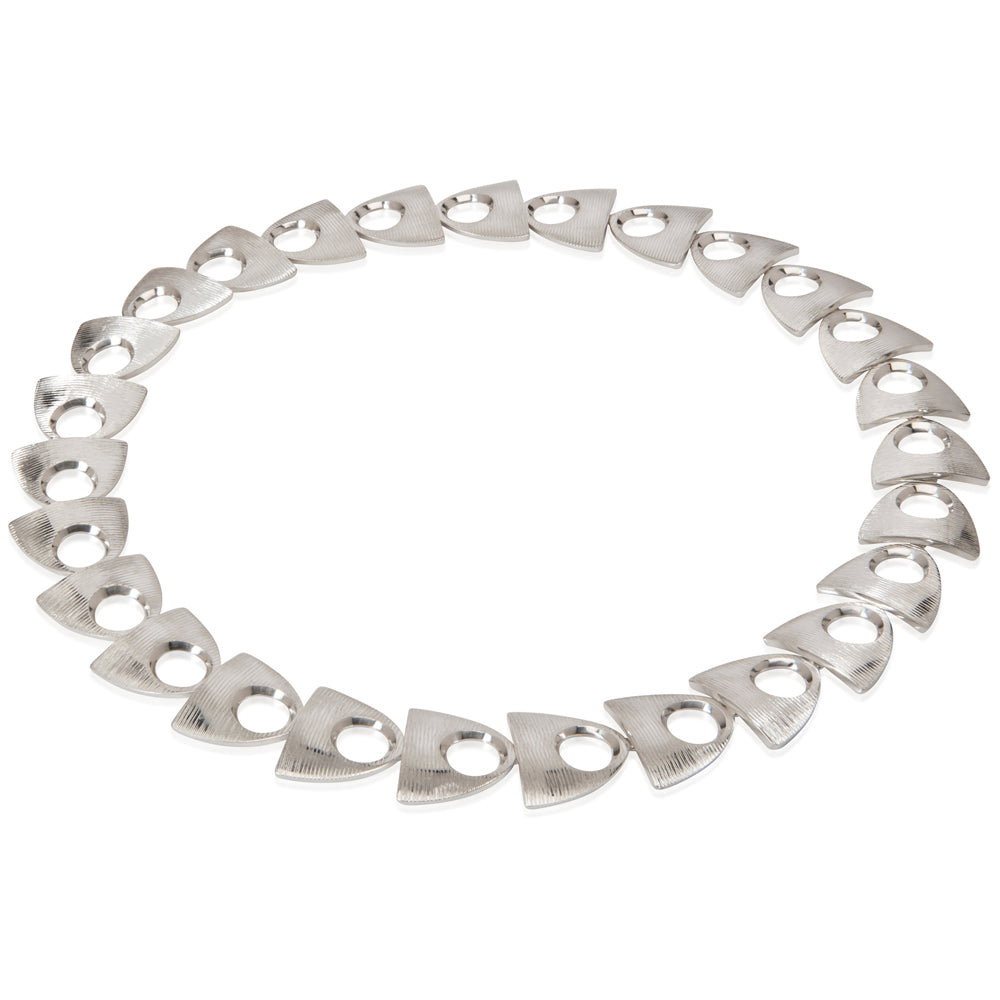 Herring neckpiece with deep textured silver by Sarah Herriot.