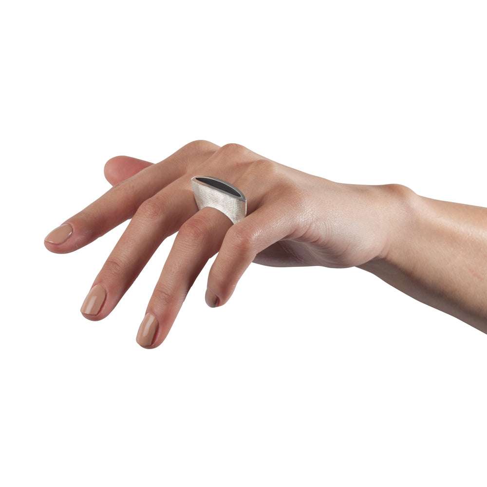 Herring ring in silver with deep textured surfaces by Sarah Herriot.