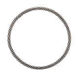 A solid silver torque featuring an abstract rhythmic linear pattern dancing across the surface, the ultimate in understated elegance, with a seamless tension clasp. This timeless piece combines technical precision with minimalist design, offering effortless wearability without compromising on craftsmanship. Jazz tension torque by Sarah Herriot.