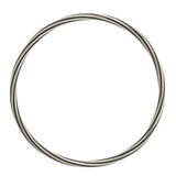 A solid silver torque featuring an slowly turning linear pattern rolling across the surface, the ultimate in understated elegance, with a seamless tension clasp. This timeless piece combines technical precision with minimalist design, offering effortless wearability without compromising on craftsmanship. Lazy torque by Sarah Herriot.